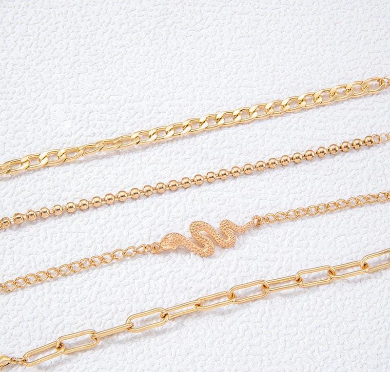 Bold Snake Charm Chain Bracelet Set – 4-Piece Gold Layered Style