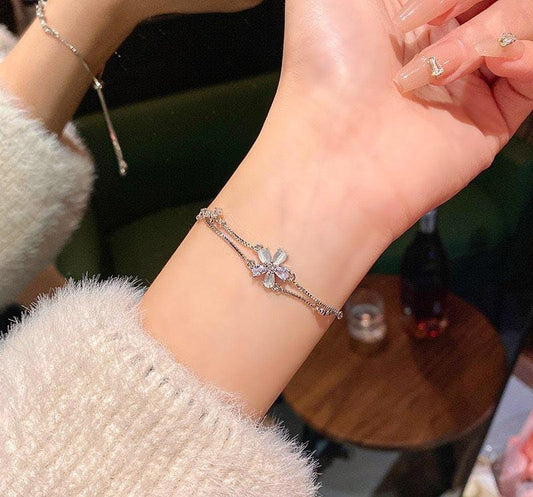 Silver Flower Charm Bracelet – Adjustable & Elegant Design