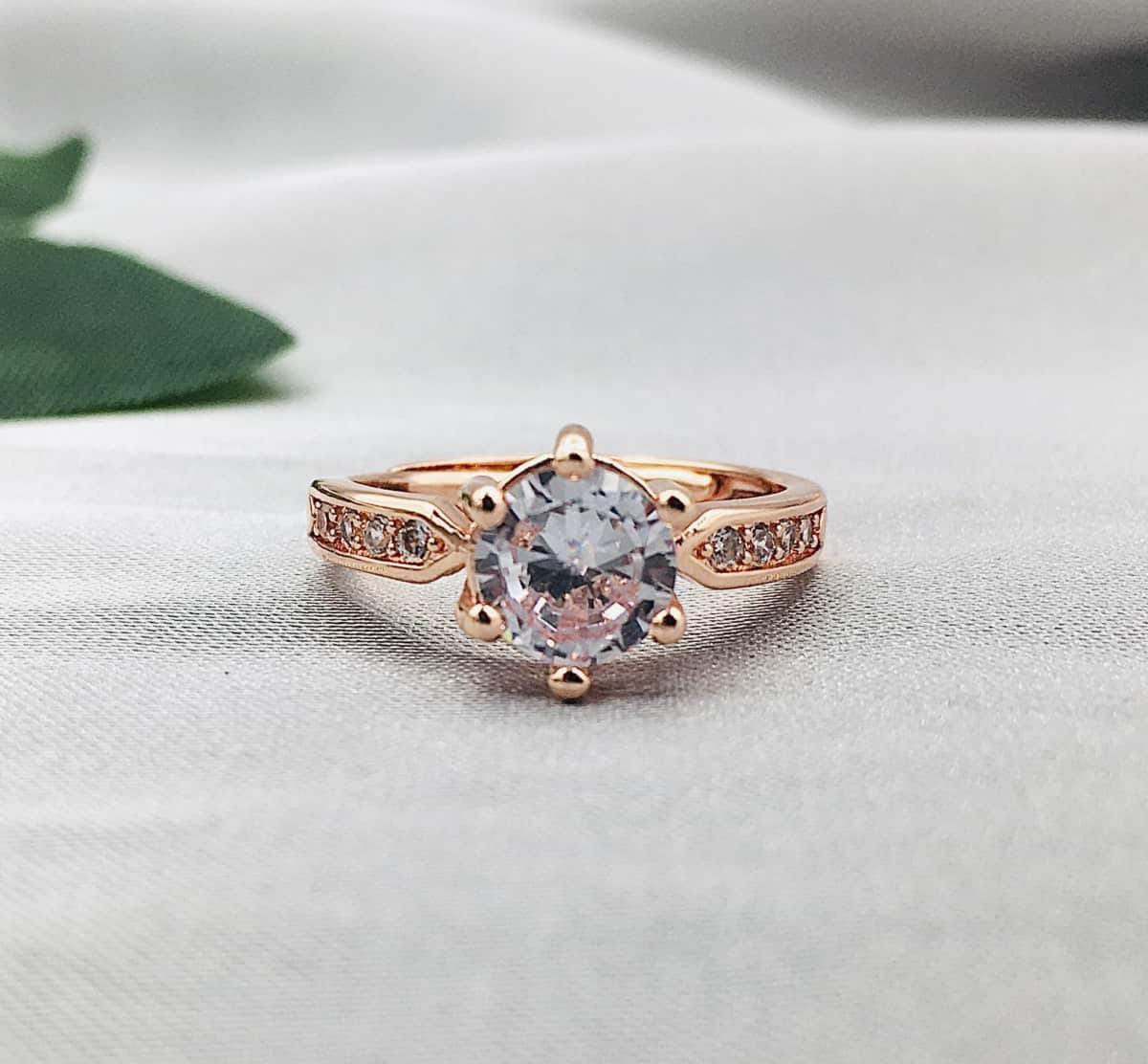 Rose Gold Solitaire Ring – Timeless & Radiant