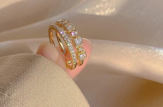 Elegant Gold Triple-Band Ring – Sparkling Cubic Zirconia Accents