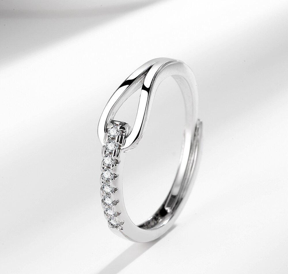Silver Knot Diamond Ring – Sleek & Sparkling.