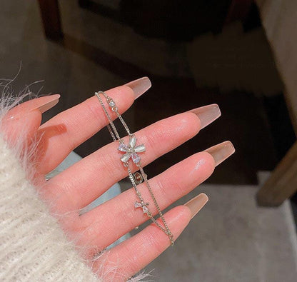 Silver Flower Charm Bracelet – Adjustable & Elegant Design