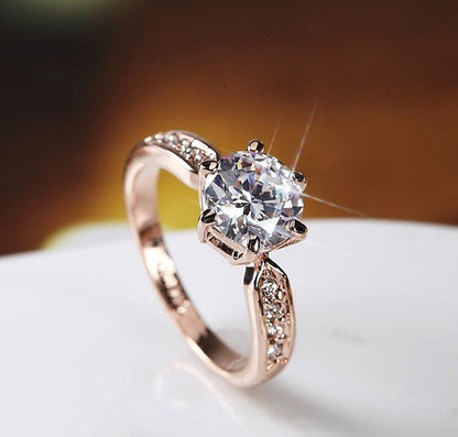 Rose Gold Solitaire Ring – Timeless & Radiant