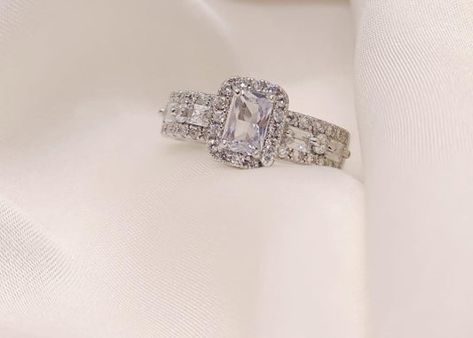 Radiant Halo Engagement Ring – Sparkling Silver Elegance
